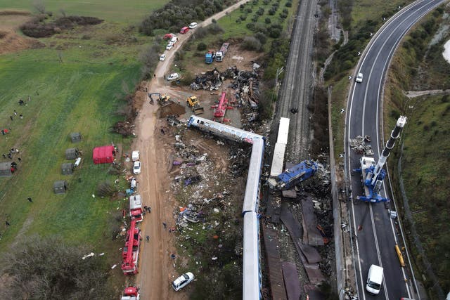 <p>The wreckage of the trains lie on the rail lines in Greece </p>
