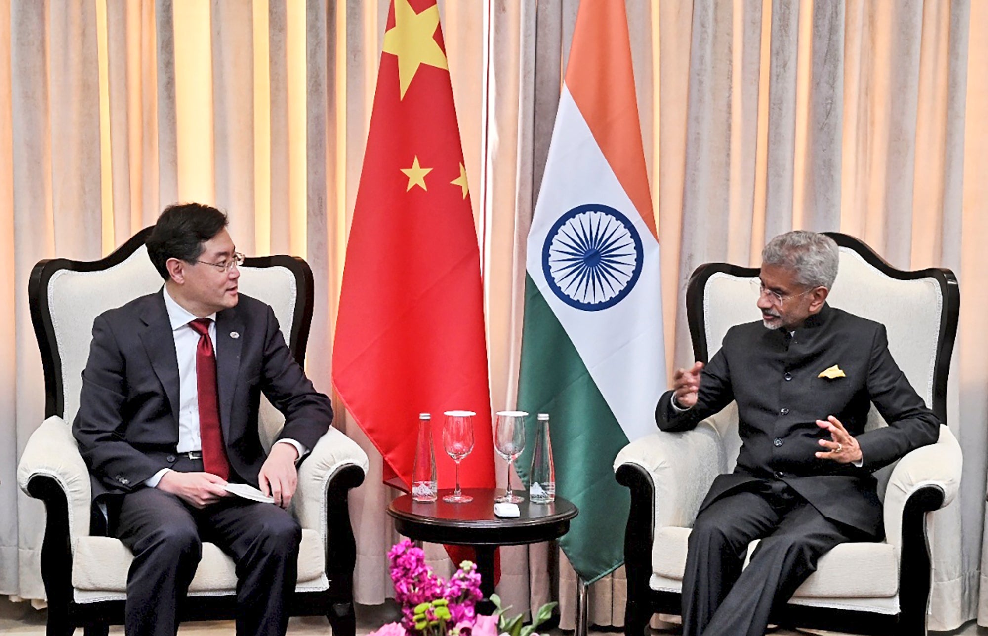 Indian foreign minister S Jaishankar talks with his Chinese counterpart Qin Gang on the sidelines of G20 foreign ministers meeting