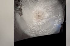 Moment missing hiker trapped under avalanche waves down rescue helicopter