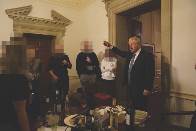 The then prime minister Boris Johnson (right) at a leaving gathering in No 10. Mr Johnson will give evidence to the Privileges Committee on the inquiry into whether he lied to Parliament, the committee said (Cabinet Office/PA)