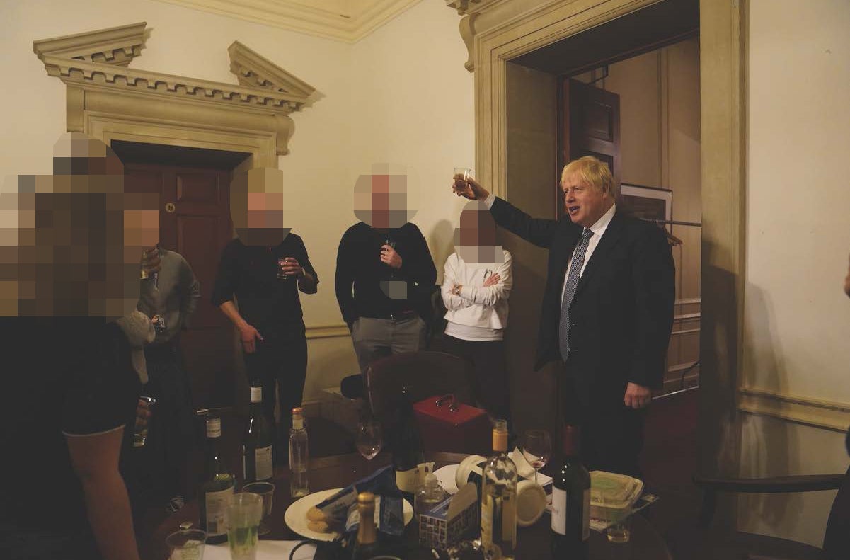 Boris Johnson at a leaving gathering in the vestibule of the Press Office of 10 Downing Street, London, when rules were in force for the prevention of the spread of Covid