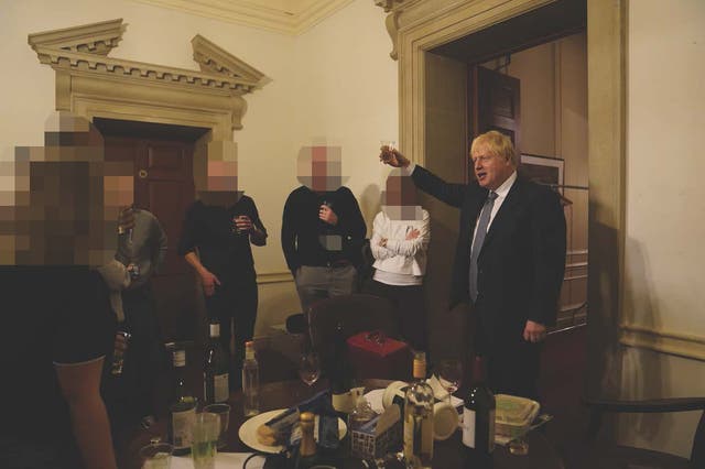 <p>Boris Johnson at a leaving gathering in the vestibule of the Press Office of 10 Downing Street, London, when rules were in force for the prevention of the spread of Covid</p>