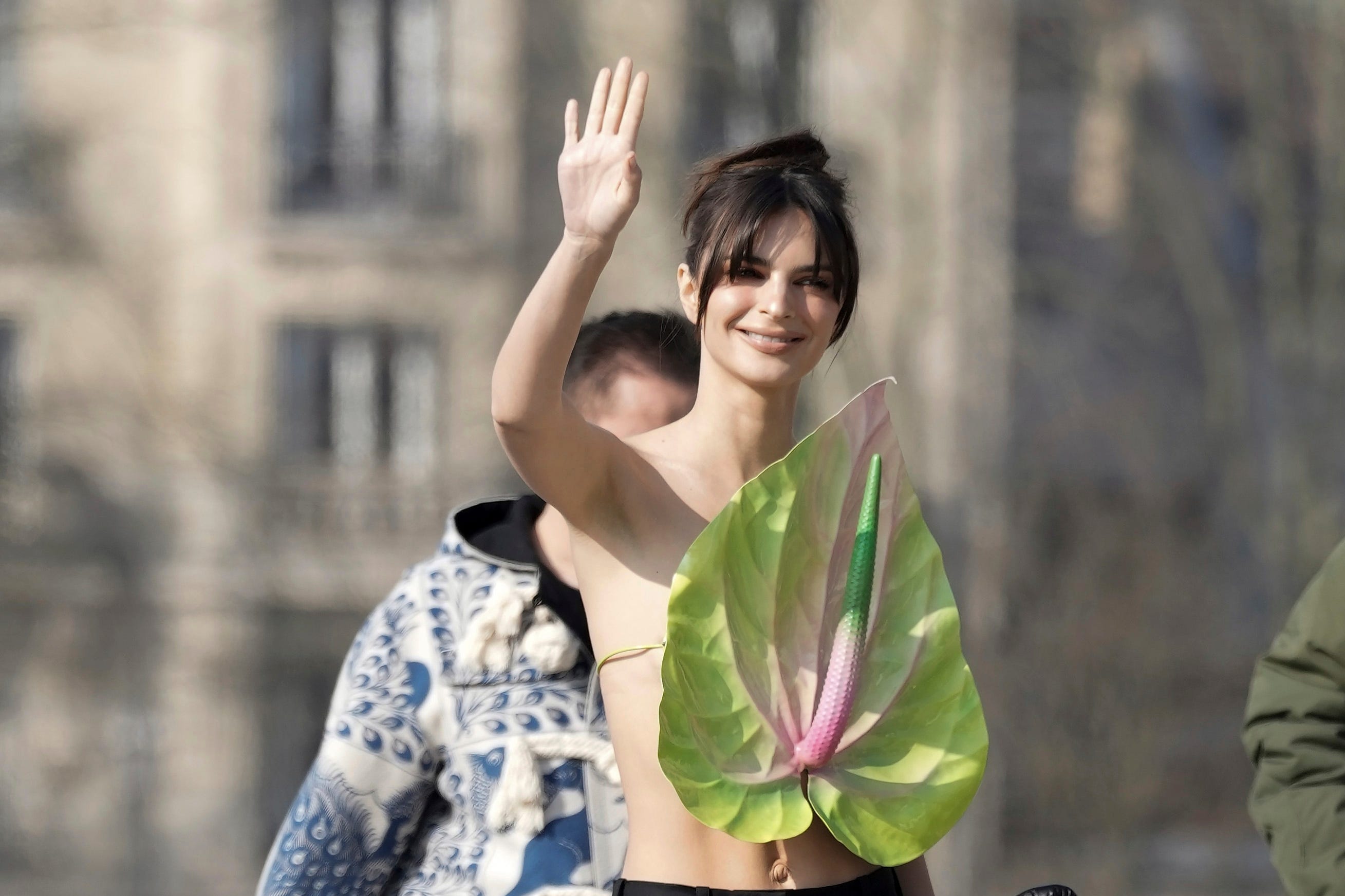 Emily Ratajkowski wears plant as a top at Paris Fashion Week