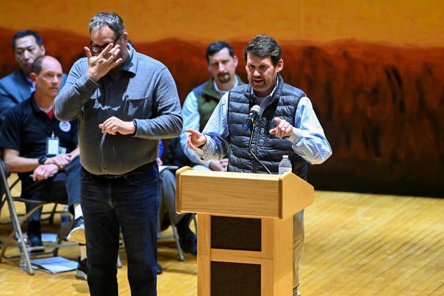 <p>Darrell Wilson, assistant vice president government relations of Norfolk Southern, the company that owns the train involved in the derailment that spilled toxic chemicals, speaks during a town hall in East Palestine on March 2, 2023</p>