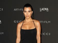 Kourtney Kardashian responds to pregnancy speculation by discussing IVF effects