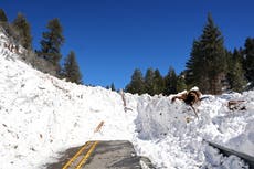 California mountain towns cut off for a week after 10 feet of snow