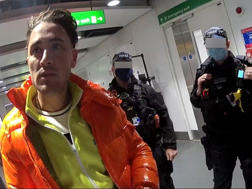 Stephen Bear being arrested at Heathrow Airport