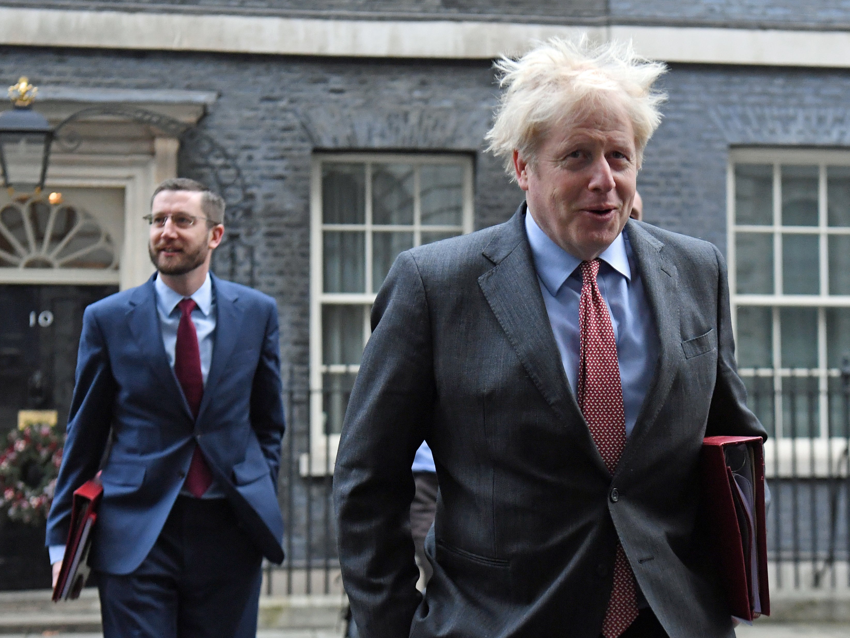 Boris Johnson, accompanied by cabinet secretary Simon Case