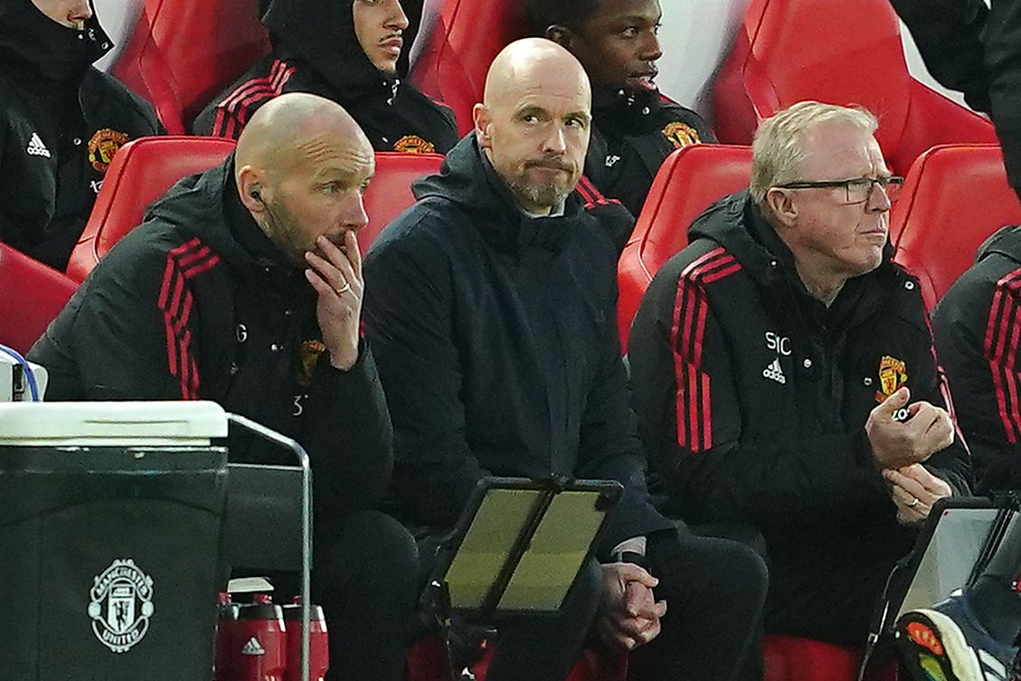Manchester United manager Erik ten Hag (centre) saw his side humiliated at Anfield (Peter Byrne/PA)