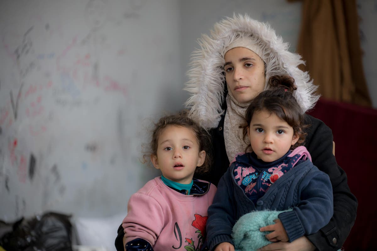 The girls are still asking to go home a month after the earthquake, says a Syrian mother