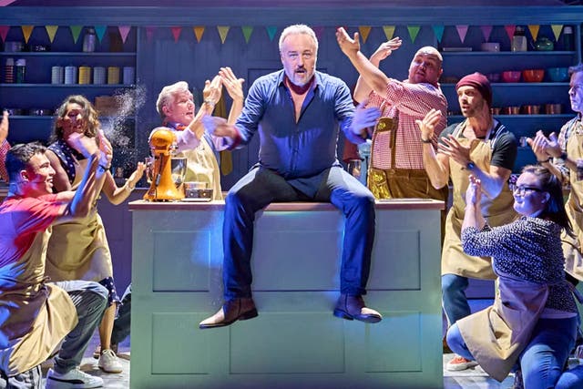 <p>John Owen-Jones as Phil Hollinghurst with contestants in ‘The Great British Bake Off Musical’ </p>