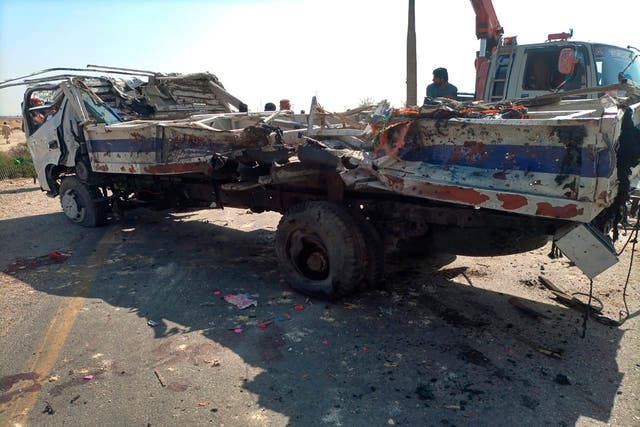 <p>A damaged truck is removed from the site of a suicide bombing, in Sibi, a district in the Pakistan’s Balochistan province </p>
