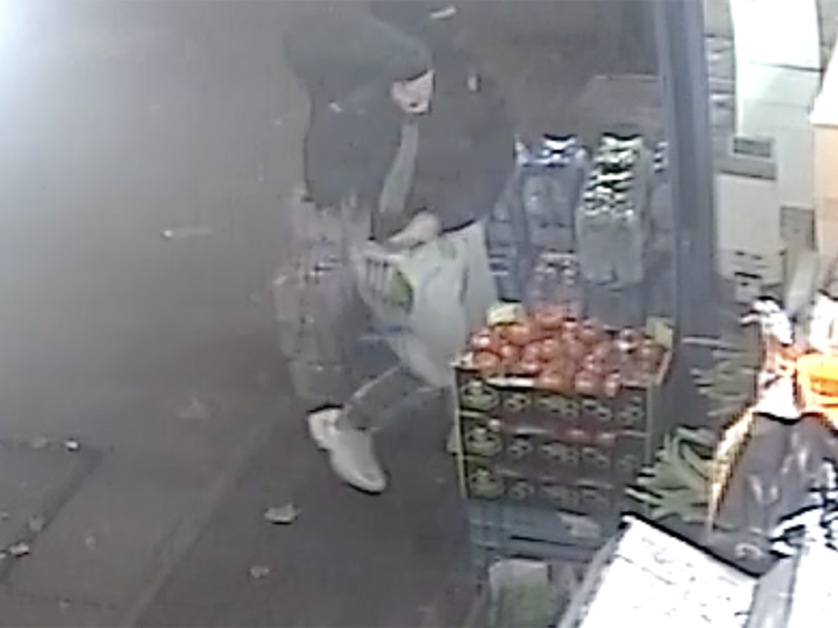 CCTV shows moment masked man armed with machete robs London shop