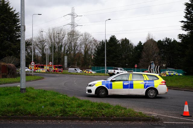 Emergency services at the scene in the St Mellons area of Cardiff where three people died in a road traffic collision. Two others who had also been reported missing have been transported to hospital with serious injuries. (Ben Birchall/PA)