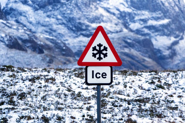 A road warning sign for ice on the A82 through Glencoe. People across many parts of the country are bracing themselves for few days of travel disruption as snow, ice and bitterly cold temperatures grip the nation (Jane Barlow/PA)