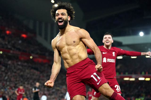 Mohamed Salah celebrates his club-record 129th Premier League goal for Liverpool (Peter Byrne/PA)