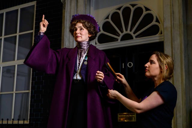 Madame Tussauds London’s artist, Luisa Compobassi, puts the finishing touches to Suffragette and feminist trailblazer Emmeline Pankhurst’s new figure ahead of its arrival at the attraction to mark International Women’s Day (Madame Tussauds London/PA)