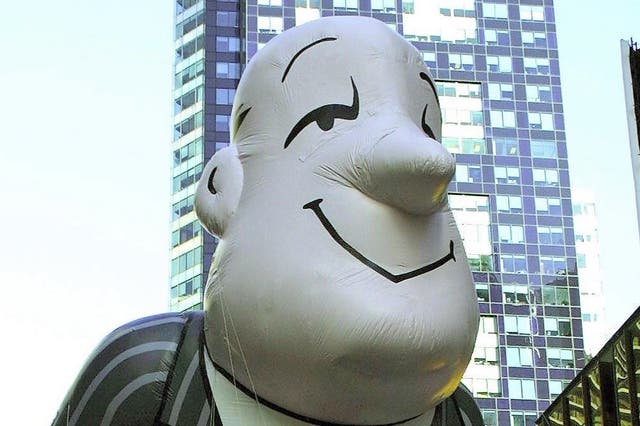 <p>The Ask.com Jeeves balloon moves through Times Square in New York 23 November, 2000, during the 74th Macy’s Thanksgiving Day Parade</p>