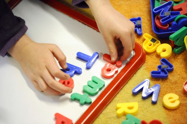 The UK’s gender pay gap has widened as sharp increases in the cost of childcare has worsened a “motherhood penalty”, pricing women out of work, according to a new report (Dominic Lipinski/ PA)