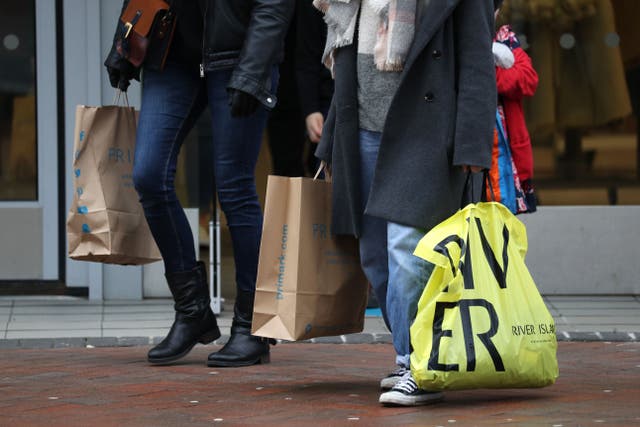 Consumers have continued to spend despite the cost-of-living crisis (Andrew Matthews/PA)