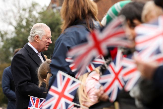 Charles speaks to members of the public as he arrives for a visit to Colchester Castle (Chris Radburn/PA)