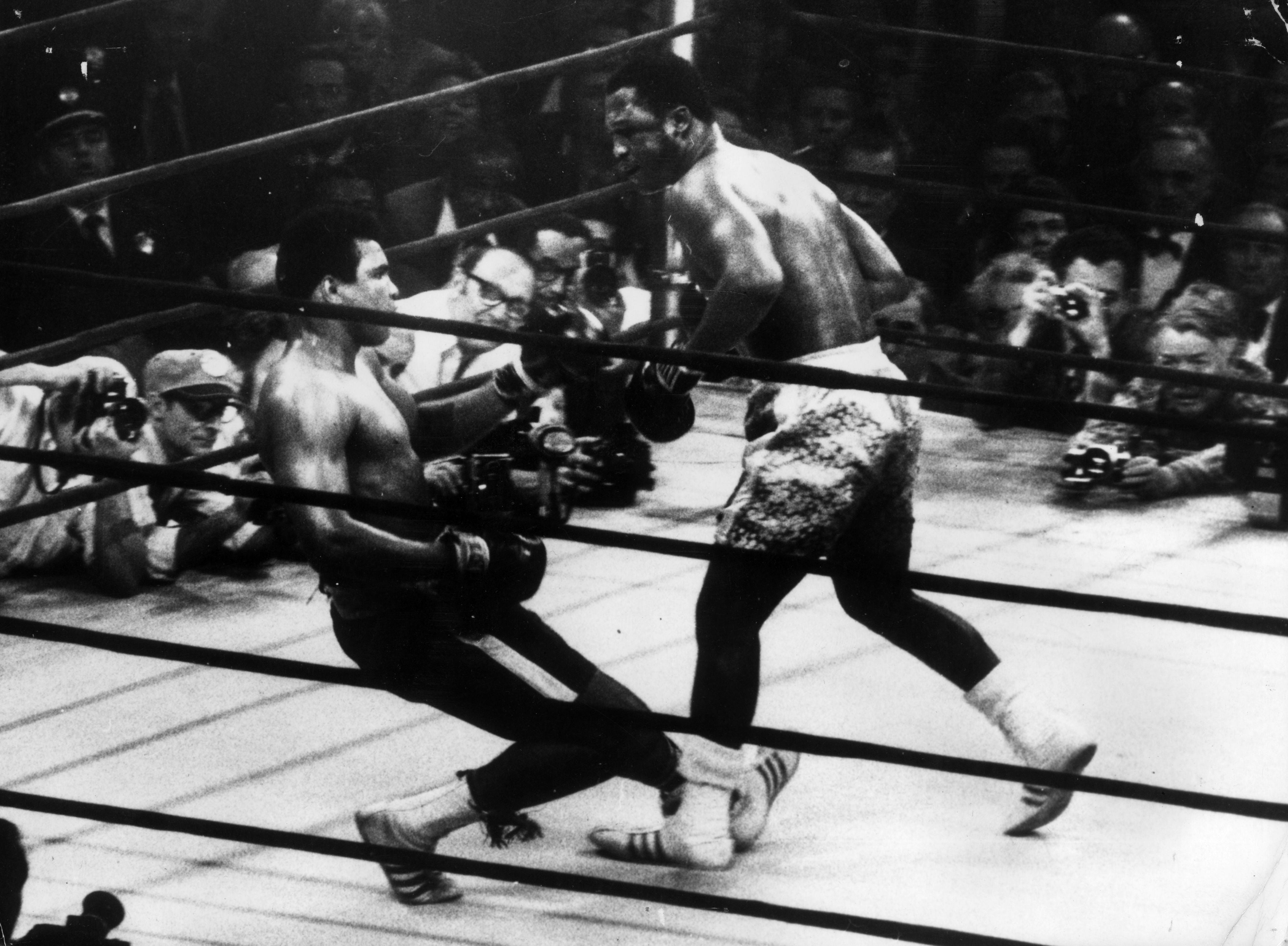In a title fight at Madison Square Gardens, New York, Muhammad Ali goes down in the 15th round to a left hook from world heavyweight champion Joe Frazier who kept the title with an unanimous points win.