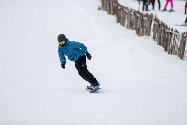 A snowboard on the slopes at the Lecht Ski Centre at Strathdon in the Cairngorms (Paul Campbell/PA)