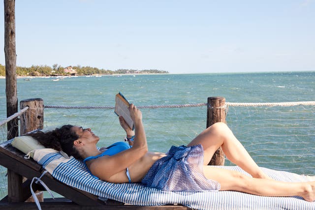 <p>Many people said are more confident about their book choices when on holiday, reading subject matter they’d be too embarrassed to when at home</p>