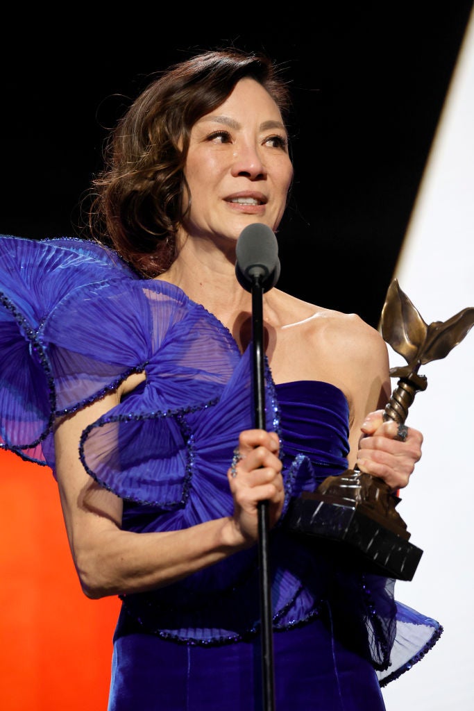 Yeoh collects her Best Actress trophy at the Independent Spirit Awards last weekend