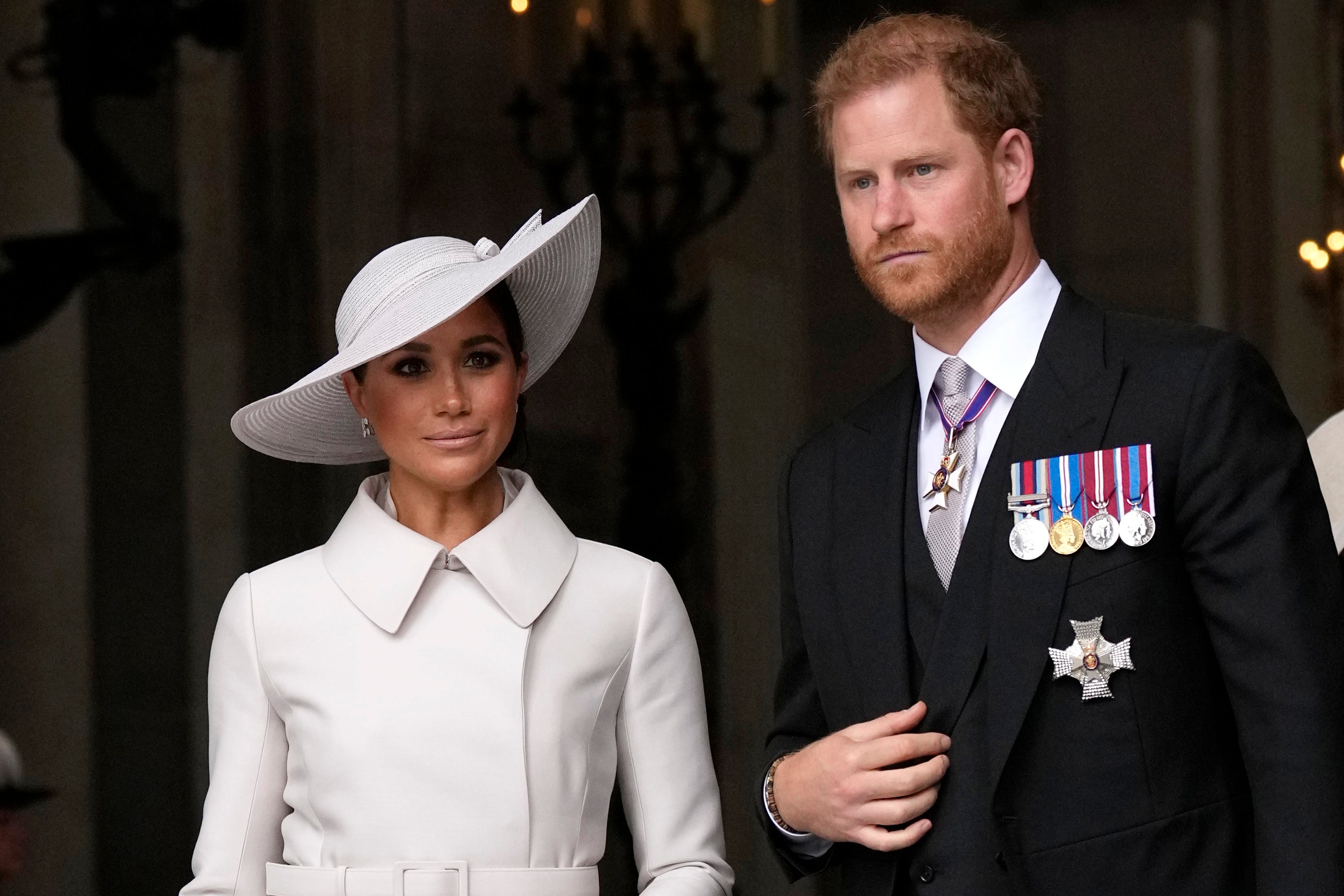 Harry and Meghan leave a service of thanksgiving for Queen Elizabeth II at St Paul’s Cathedral in 2022