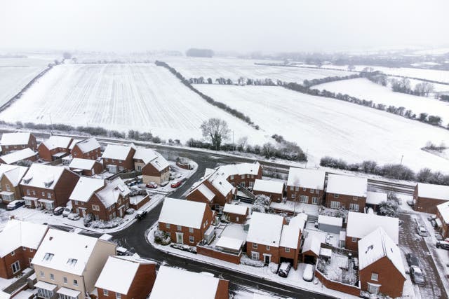 Heavy snow covers houses and fields in Northamptonshire (Joe Giddens/PA)