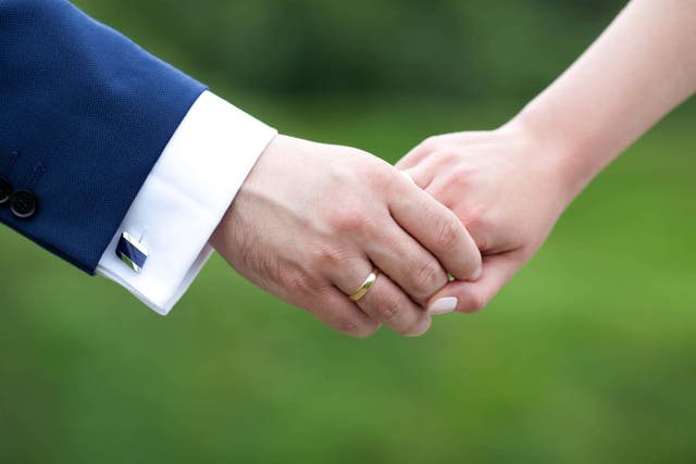 A Tory MP has said marriage a ‘sacred bond between man and woman’ (Alamy/PA)