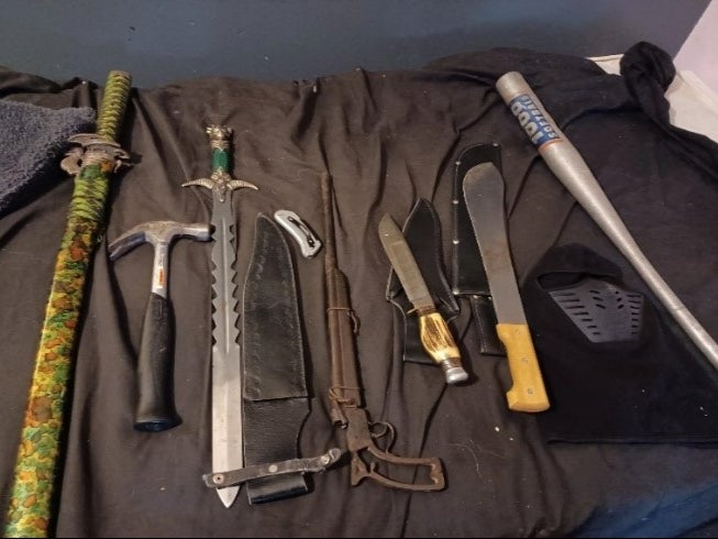 Five firearms and 51 weapons including knives, machetes and swords were seized