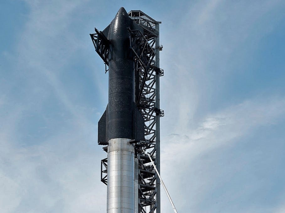 SpaceX’s first orbital Starship stacked atop its massive Super Heavy Booster at the company’s Starbase facility near Boca Chica Village in South Texas on 10 February, 2022
