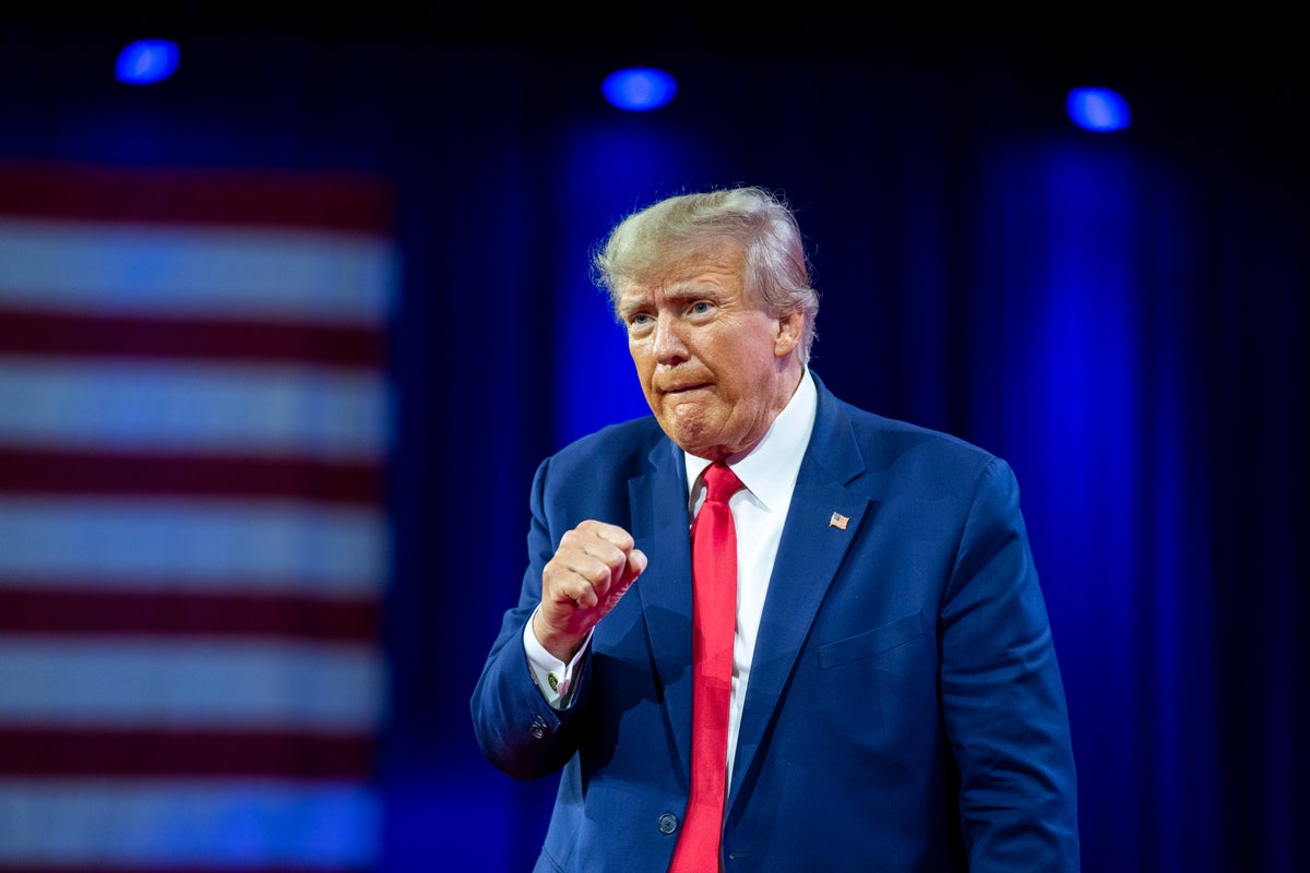 Trump goes after GOP foes Ron DeSantis and Mitch McConnell in Iowa rally speech – latest