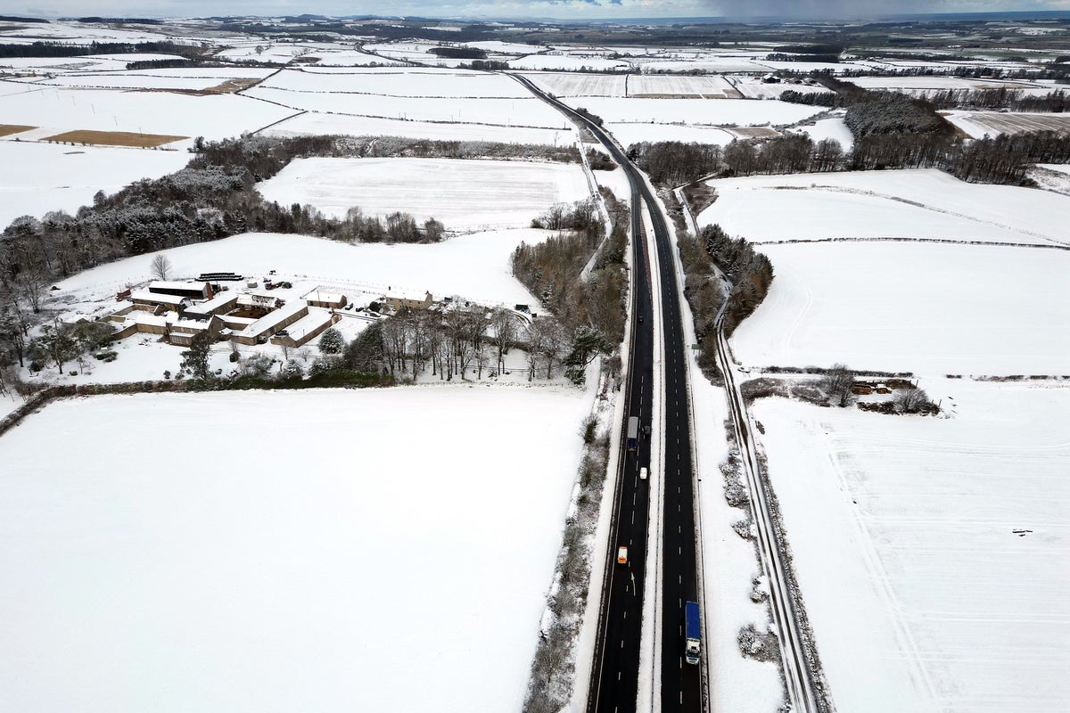Storm Larisa batters parts of UK with blizzards as travel warnings issued