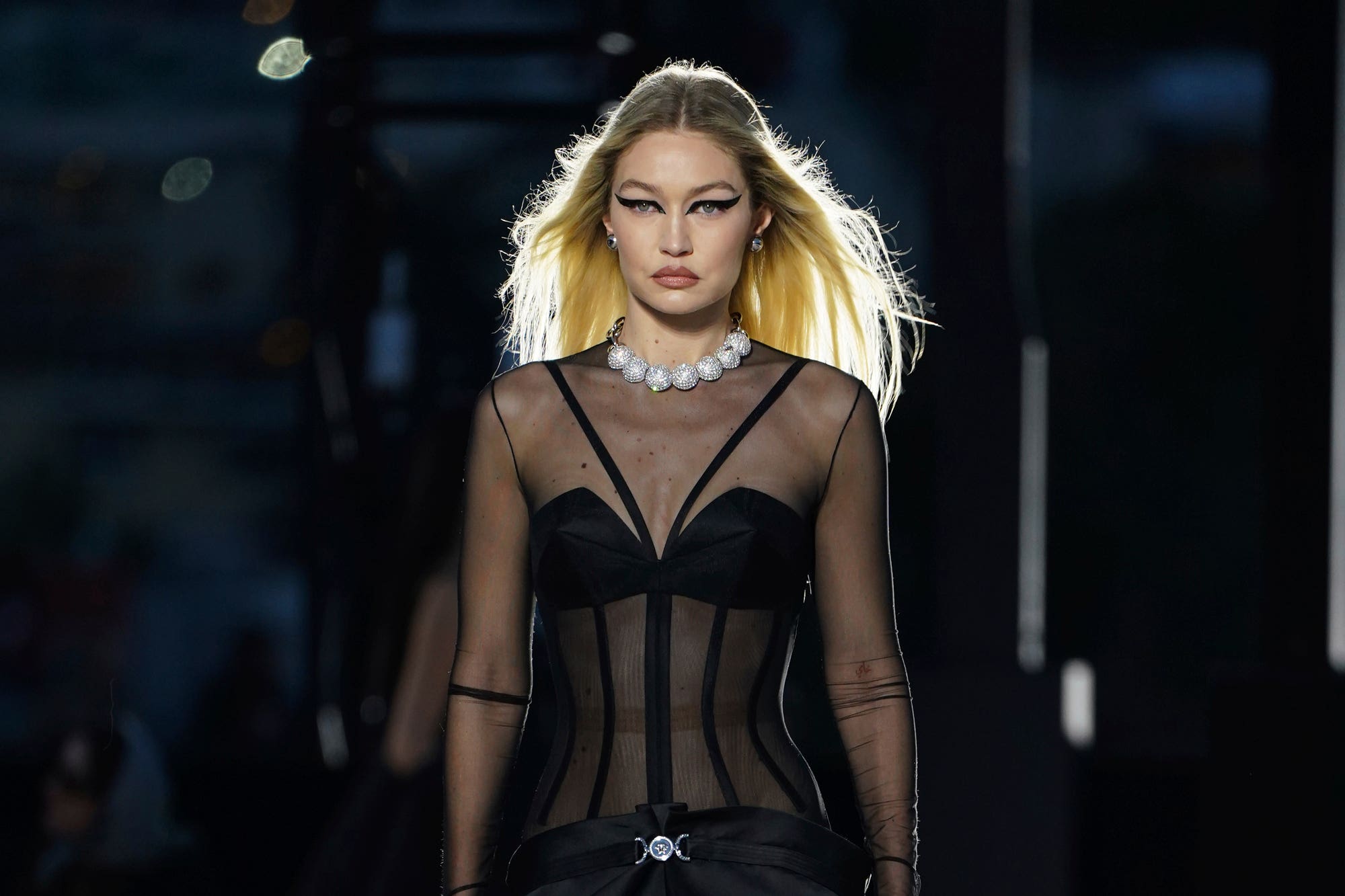 Gigi Hadid walks the runway for Versace Fall-Winter 2022 Show during Milan  Fashion Week in