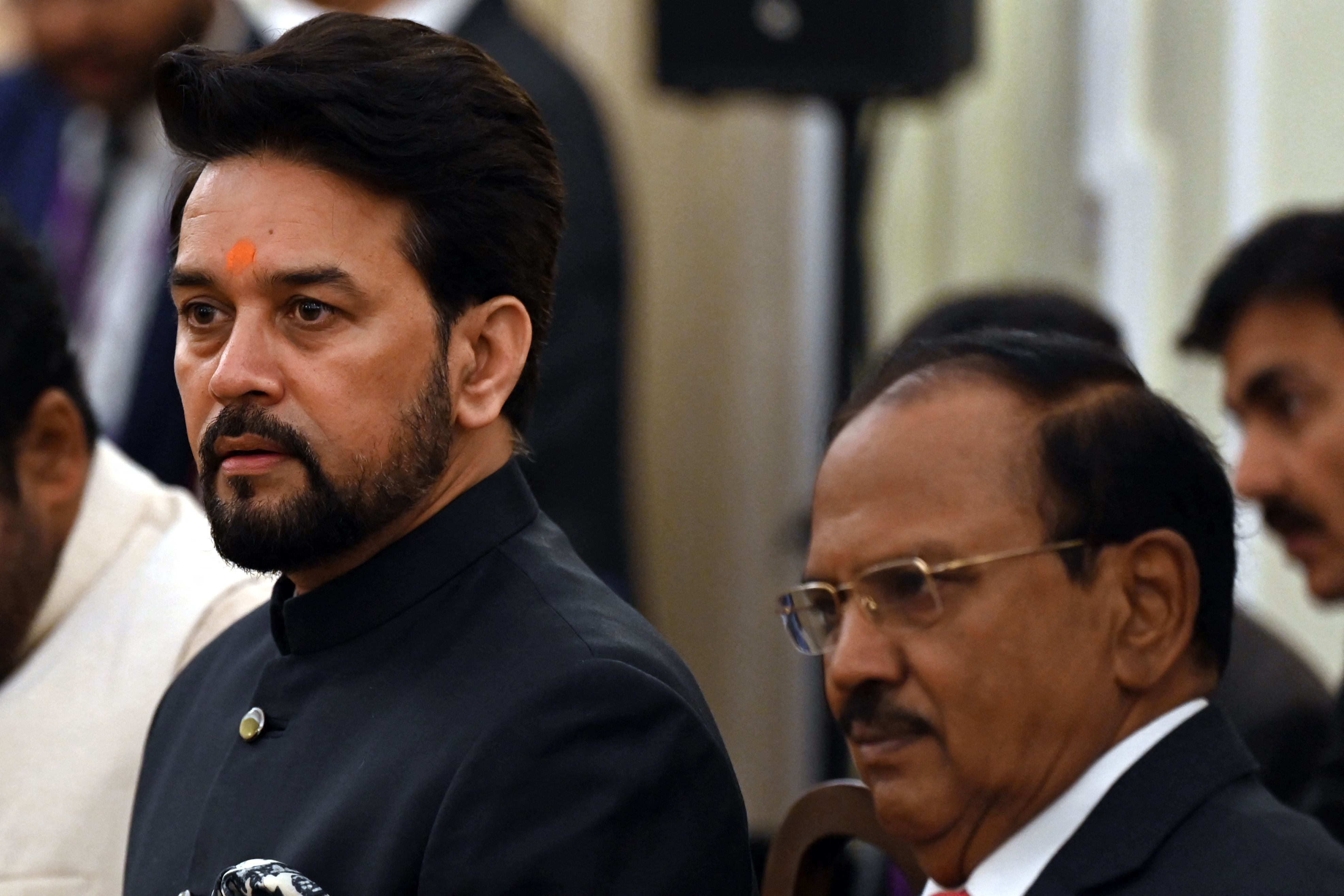 India’s minister of information and broadcasting Anurag Thakur (L) and national security advisor Ajit Doval at the Hyderabad House in New Delhi