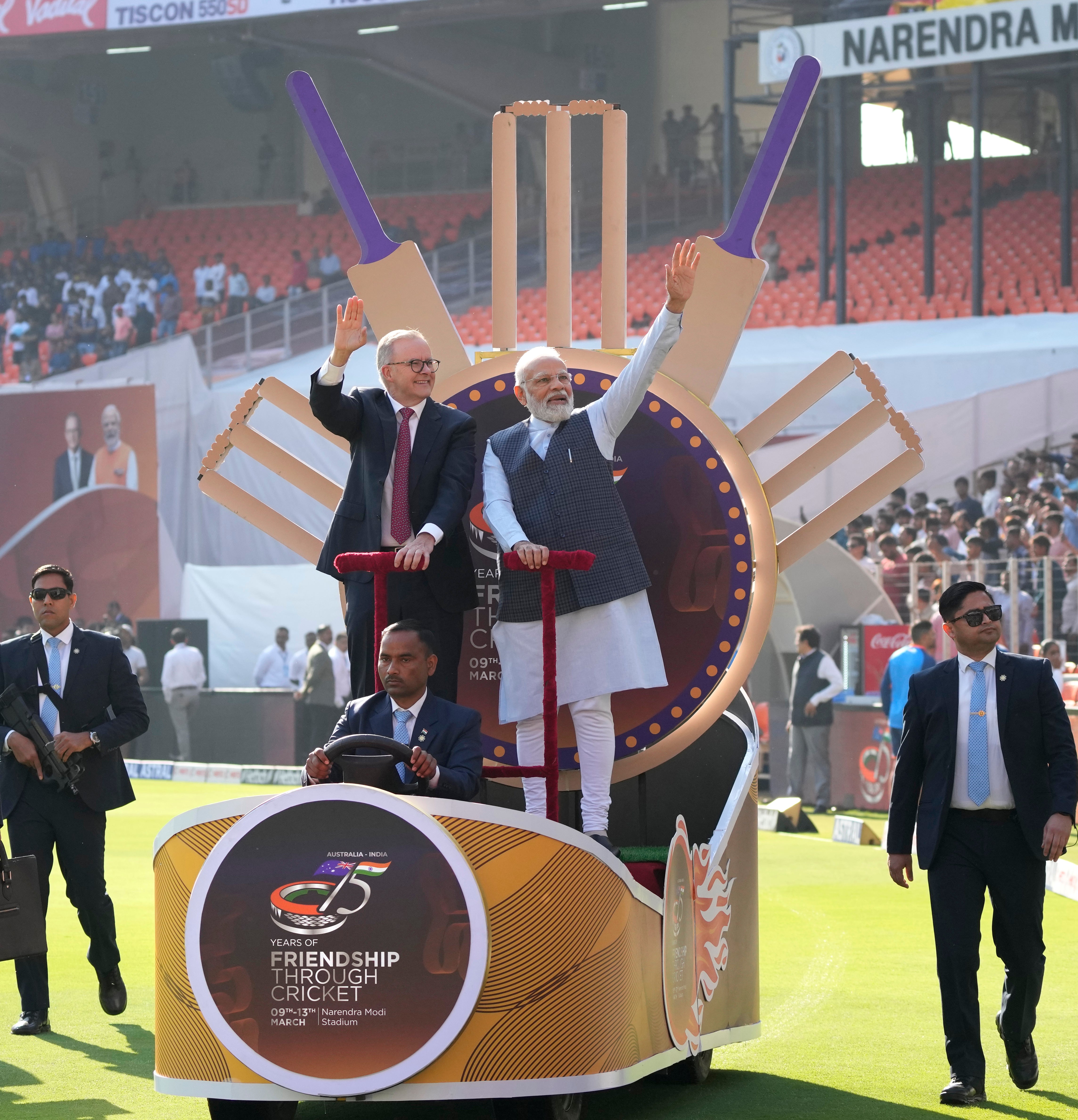 Modi with his Australian counterpart Anthony Albanese wave as they arrive in the stadium to watch fourth cricket test match between India and Australia