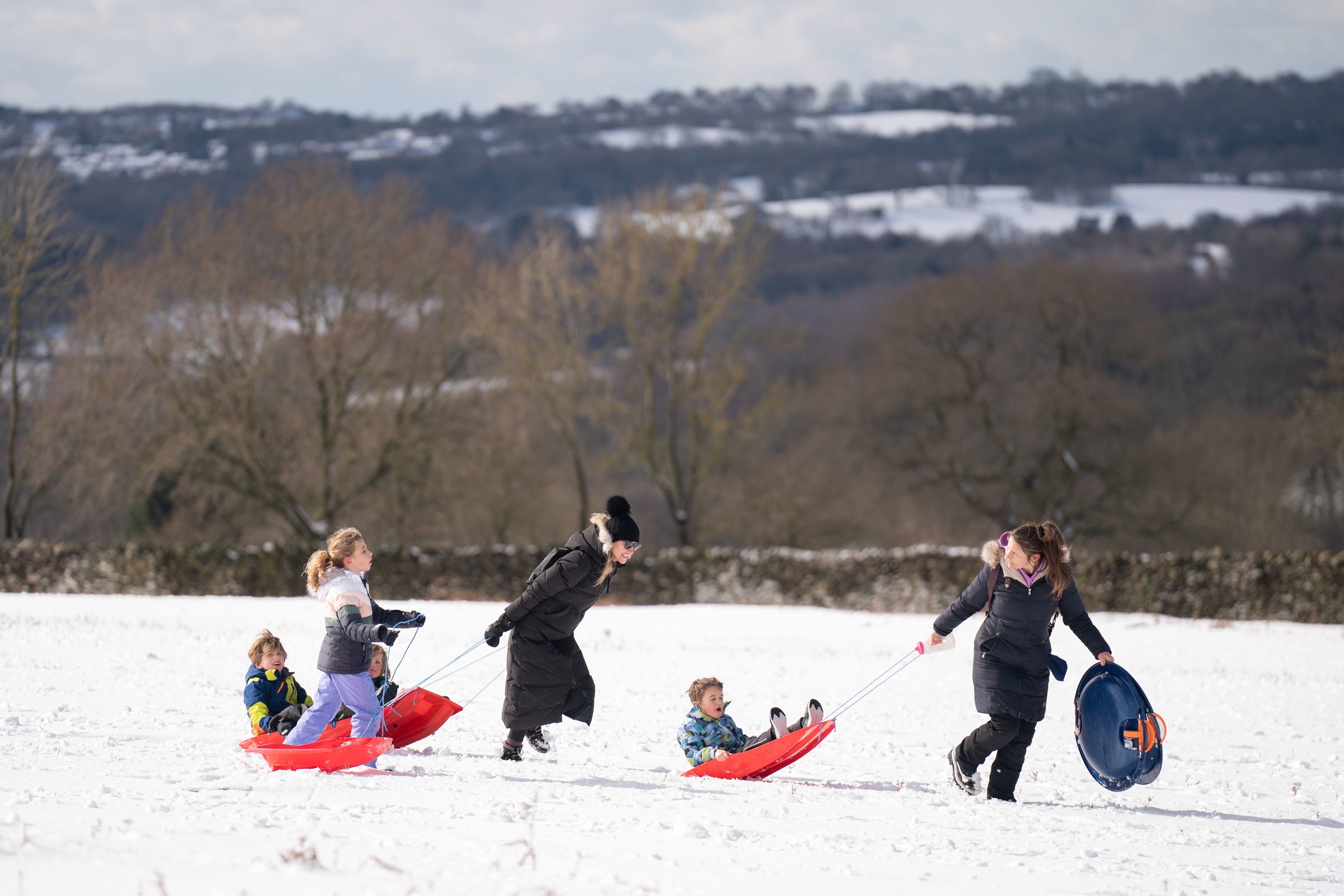 People sledging in the snow at Bradgate Park in Leicestershire Picture date: Friday March 10, 2023