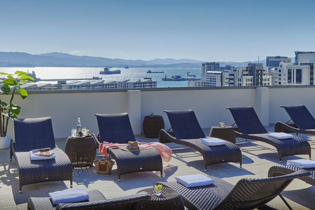 <p>This sun-soaked terrace at The Eliott Hotel is the perfect place to relax</p>
