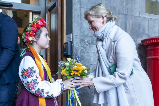 The new Duchess of Edinburgh meets Marianna Melnyk, aged 10, from the Ukrainian community at the City Chambers in Edinburgh to mark one year since the city’s formal response to the invasion of Ukraine (Jane Barlow/PA)