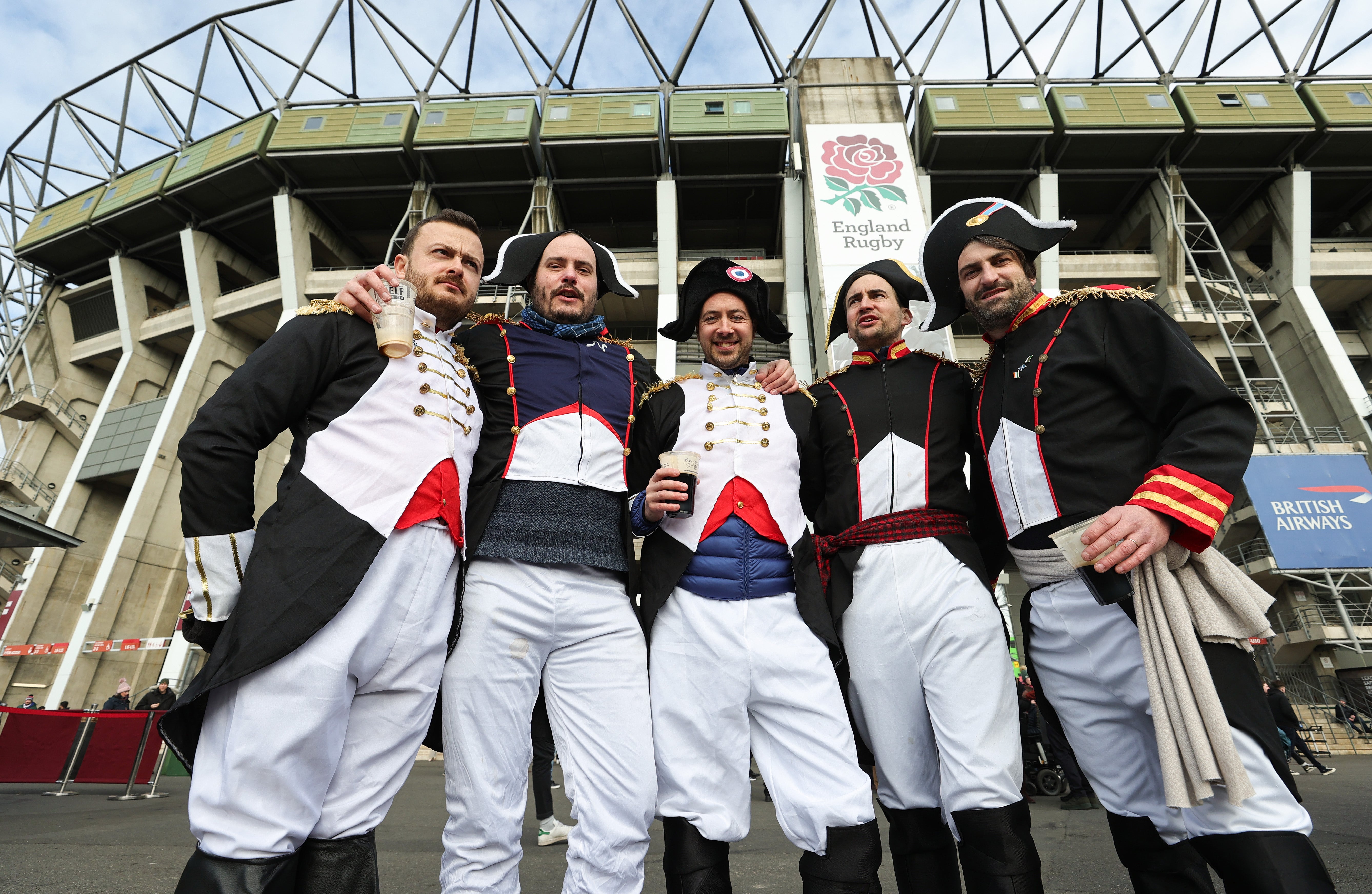 Napoleon’s legacy of being stereotypically French is embraced by these rugby fans outside Twickenham at the Six Nations game between England and France in March 2023