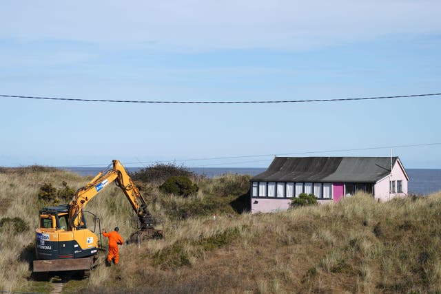 A clifftop house set to be demolished (Joe Giddens/PA)