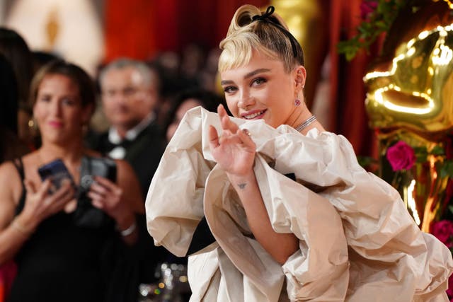 Florence Pugh arrives at the Oscars on Sunday, March 12, 2023, at the Dolby Theatre in Los Angeles (Jordan Strauss/Invision/AP/PA)