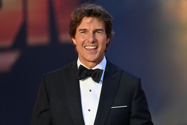 <p>File. Tom Cruise poses upon arrival for the UK premiere of the film <em>Top Gun: Maverick </em>in London, on 19 May 2022</p>