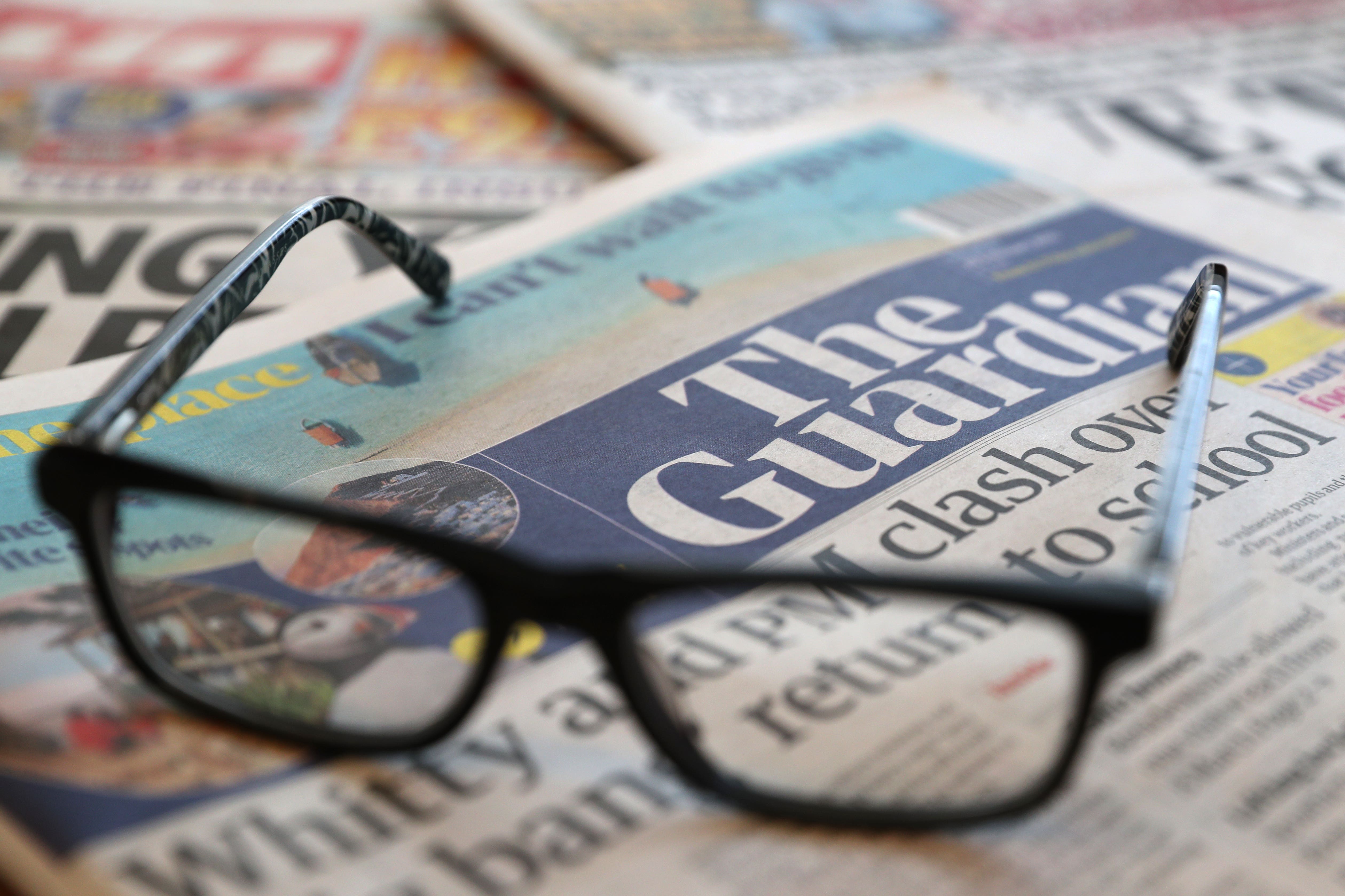 A stock image of a pile of newspapers including The Daily Telegraph, The Guardian, Daily Mirror, Daily Mail, Daily Express and The Sun. Picture date: Saturday February 20, 2021.