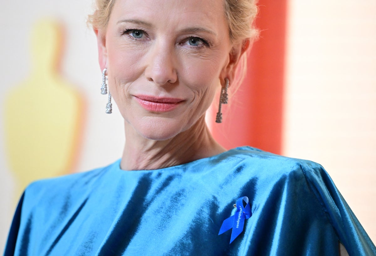 Why Are Celebrities Wearing Blue Ribbons at the Oscars?