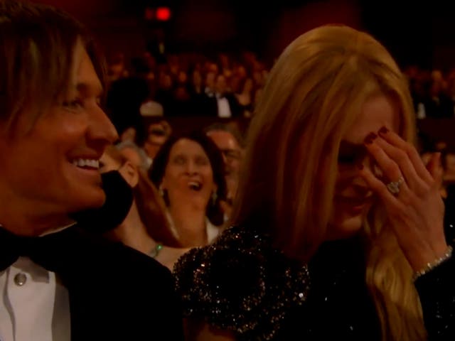 <p>Nicole Kidman laughs along as Jimmy Kimmel mocks her viral ad for AMC movie theatres in his opening Oscars monologue at the 95th Academy Awards</p>
