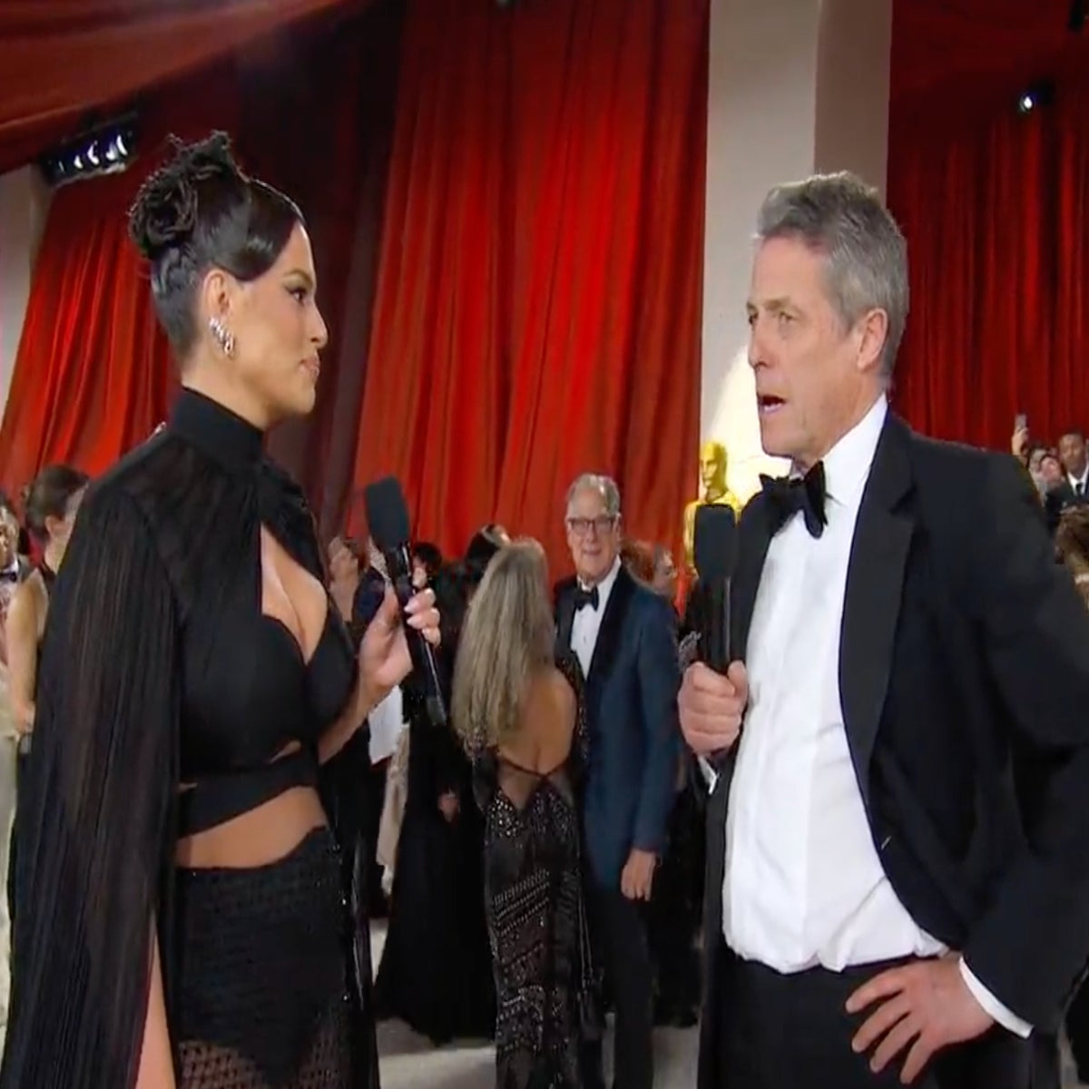 Watch Hugh Grant’s awkward red carpet interview at 2023 Oscars